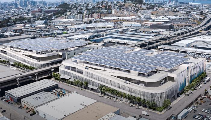 rendering of aerial view of proposed buildings with downtown SF in background