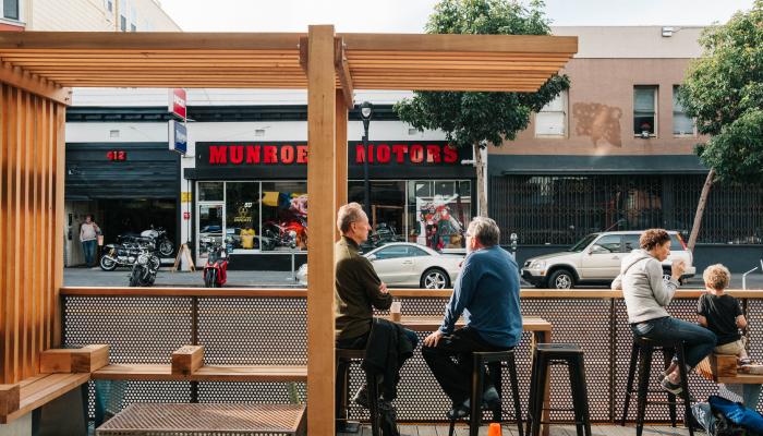 Photo of a parklet used as public space